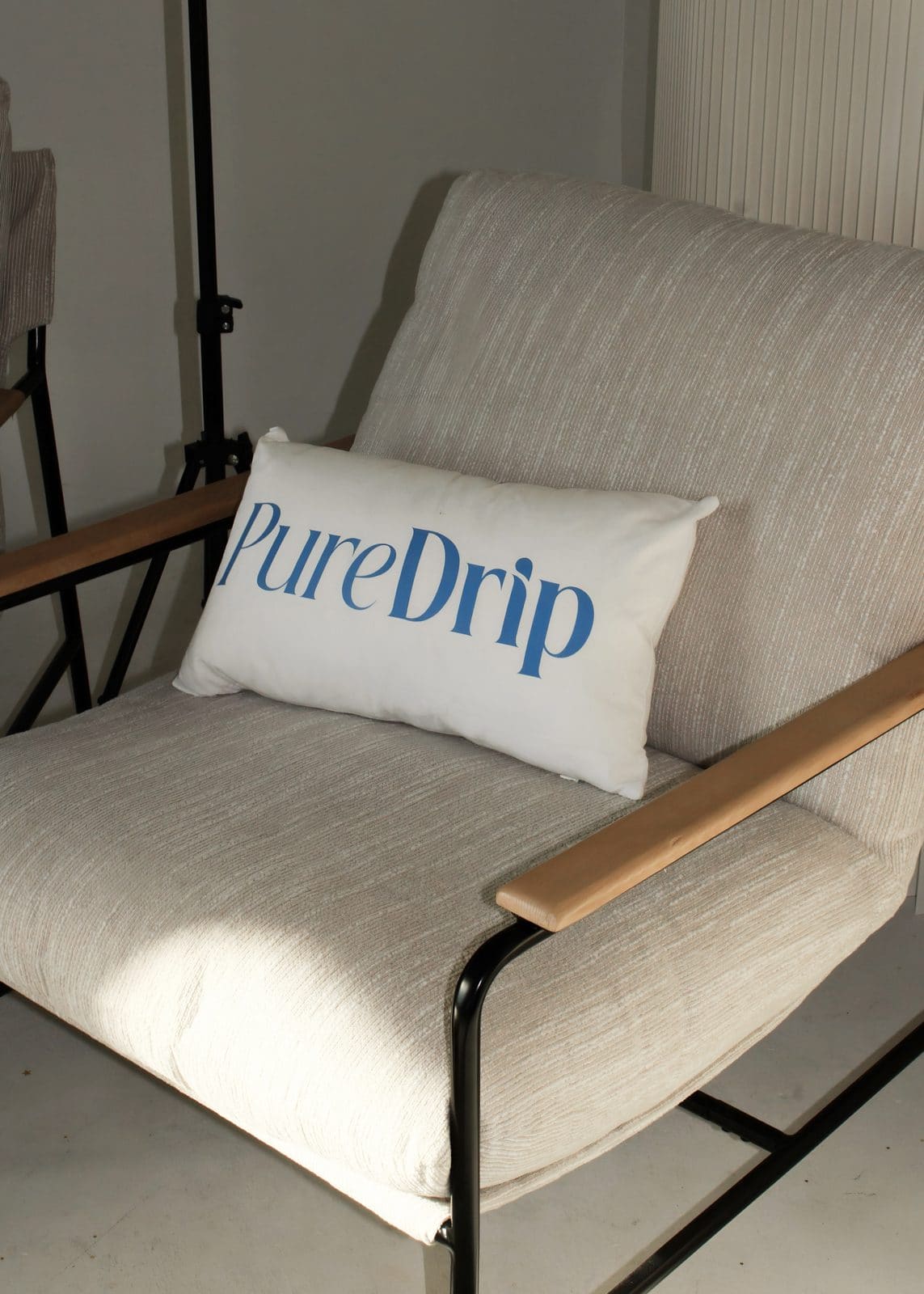 Pure Drip branded pillow and blanket in a comfortable treatment setting